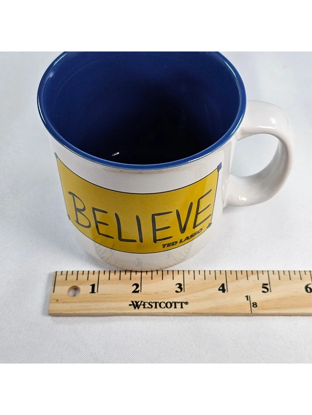 Ted Lasso Believe Ceramic Coffee Mug 20 oz White Blue Silver Buffalo WRTLA604E